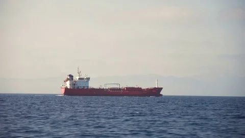 Side view of cargo ship floating in the sea Stock Footage 80826170