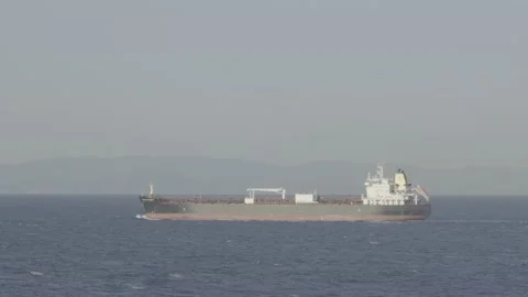 A side view of a cargo ship Stock Footage 231403937