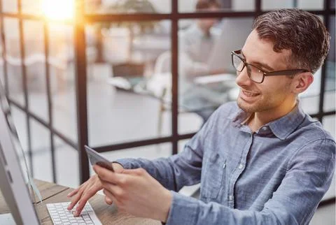 Side view ceo businessman using typing on computer pc laptop working in Stock Photos