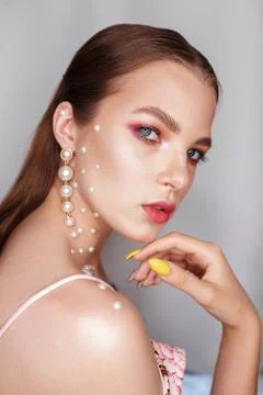 Side view of charming female model with professional makeup Foto stock