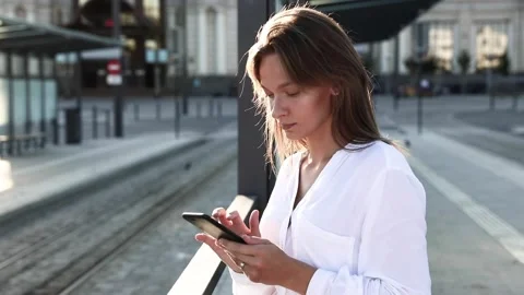 Side view of charming lady with brown hair talking online with business partners Stock Footage 136611849