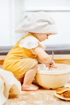 Side view of a charming one and a half year old girl Foto stock