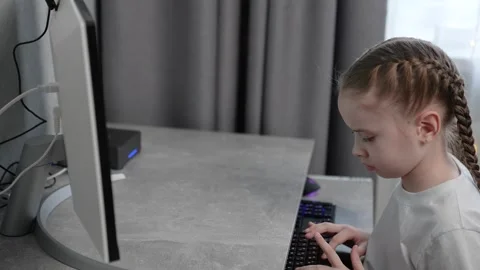 Side view child, corner study spot, simple room, future coder, powerful focus 動画素材 311896396