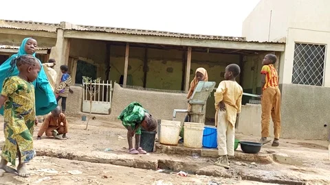 Side View Children Pumping Water Hand Pump Kano Nigeria Stock-Footage 329483504