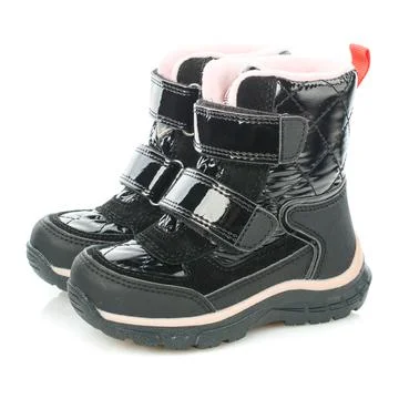 Side view of children's winter black waterproof shiny boots with pink fur for Stock Photos