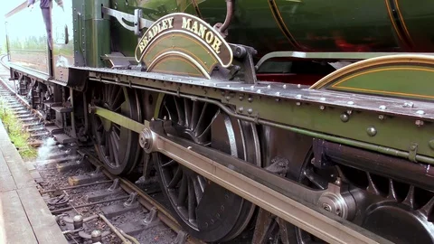 Side view classic green steam engine Stock Footage 80318663