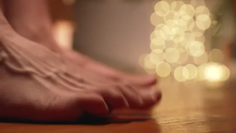 Side View Close-up of Bare Feet Doing Toe Lifting Exercise on Wooden Floor Stock Footage 292464465