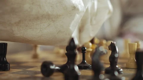 Side View Close Up of Hand Grabbing Black Chess Piece During Game Video stock 329463749