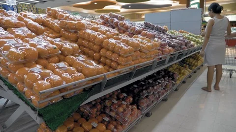 Side view close up of one pregnant woman shop in the supermarket,buying fruits 스톡 동영상 107128061