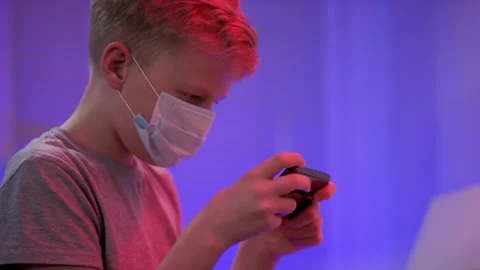 A side view close up slow motion shot of a young blonde caucasian child sitting Stock Footage 132303603