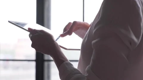 Side View Close Up Of A Woman's Hands Pressing On A Touch Screen Working Stock Footage 135755525