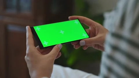 Side view of close-up woman's hands holding smartphone. Stock Footage 220096624