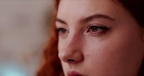 Side view close up of young red haired woman beautiful face with thoughtful Video stock 138711493