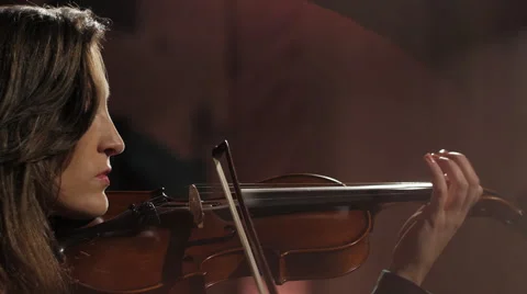 Side view closeup of girl playing violin 動画素材 44387282