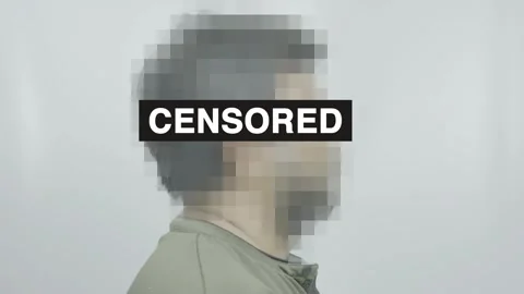 Side view closeup of man with blur and censored text text on white Stock Footage 309302097