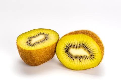 Side view closeup of two halves fresh ripe sweet kiwi fruit on white backgrou Foto stock