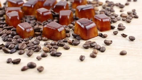 Side view of coffee ice cuber scattered on table. Stock-Footage 312512609