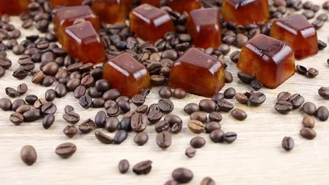Side view of coffee ice cuber scattered on table. Stock-Footage 312512614