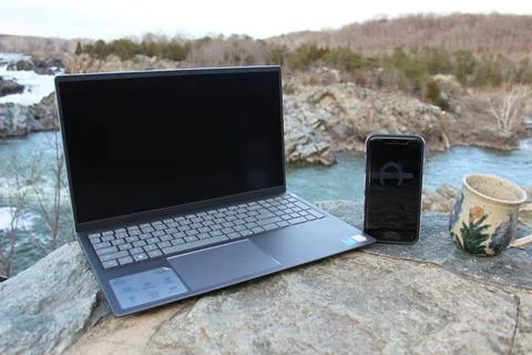 Side View Computer Coffee Mug Cell Phone Park Stock Photos