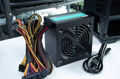 Side view of computer power supply, computer components, motherboard and el.. Stock Photos