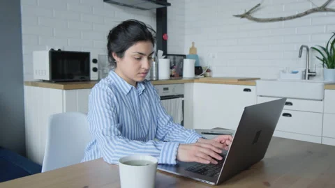 Side view concentrated young indian businesswoman working on computer Stock Footage 134442259