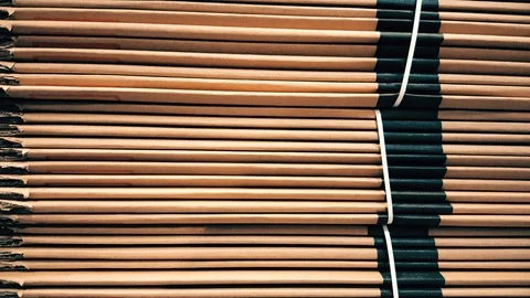 Side view of a corrugated cardboard pile in a factory Stock Footage 104489223