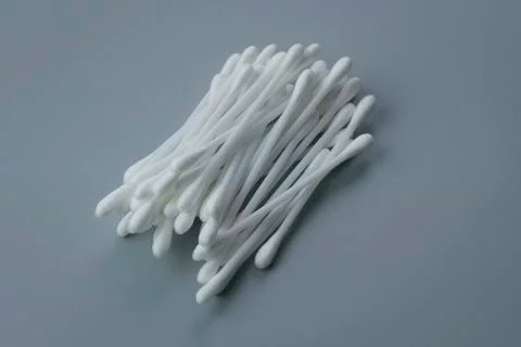 Side view of cotton buds isolated on grey background. 写真素材