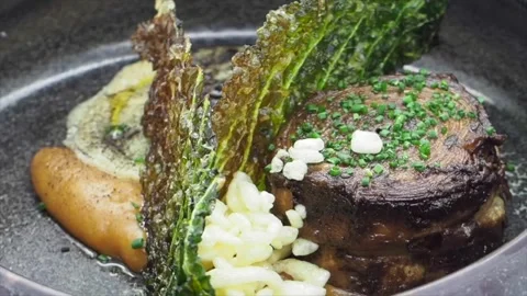 Side View Of A Course From A Tasting Menu -  Roasted Celeriac Stock Footage 133138313
