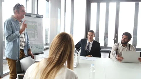 Side view of creative director discussing on a meeting with colleagues Video stock 59544075