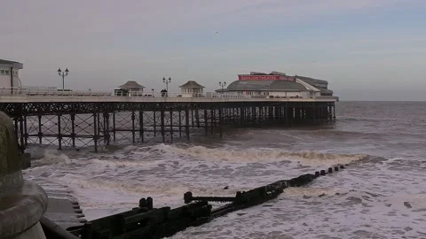 Side on view of Cromer pier, Norfolk coast 스톡 동영상 295062919