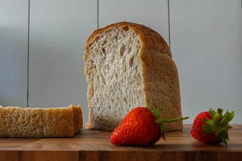 Side view of the cross-section of toast  filled with air pockets Stock Photos