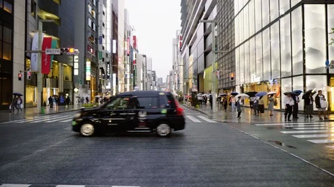Side View - Crossing Street in Tokyo Stock Footage 104472974