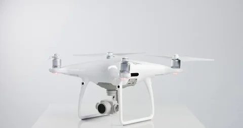 Side view of cuadrocopter phantom 4 preparing to fly Stock Footage 76995407
