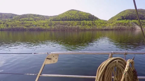 Side view from deck white steel yachts at the spring coast Stock Footage 75917049