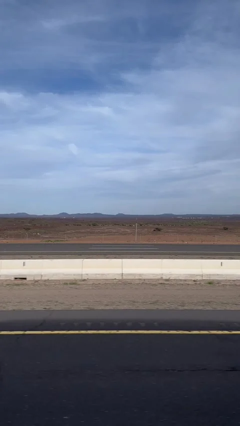 Side view of the desert valley. Saudi Arabian road trip journey. Stock Footage 288173098