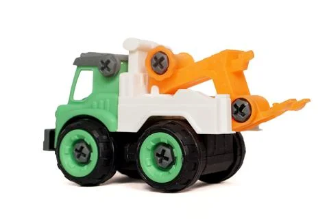 Side view of DIY plastic towing truck toy isolated on white background Stock Photos