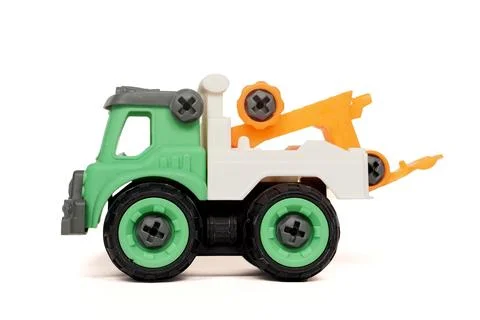 Side view of DIY plastic towing truck toy isolated on white background Stock Photos