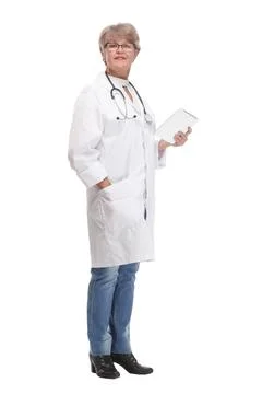Side view of a doctor using a tablet computer Stock Photos
