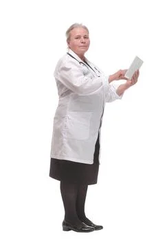 Side view of a doctor using a tablet computer - isolated over a white background 스톡 사진