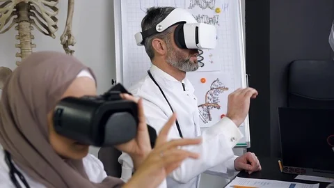 Side view of doctors or scientists which learning medicine in simulation with Stock Footage 125447496