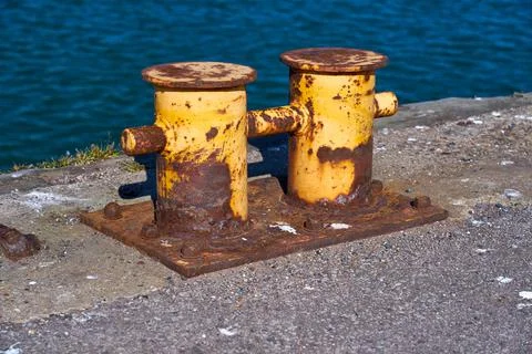 A side view of a double bitt mooring bollard Stock Photos