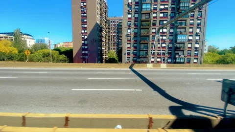 Side view driving plate from car traveling and arriving in Buenos Aires. Stock Footage 308666802