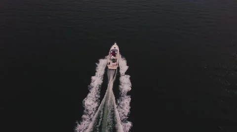 Side view of driving speed boat, aero shot Stock Footage 64807866
