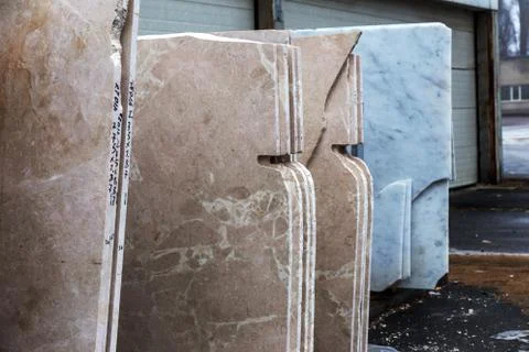 Side view of the edge of the granite slab in bulk. A stack of granite slabs - Stock Photos