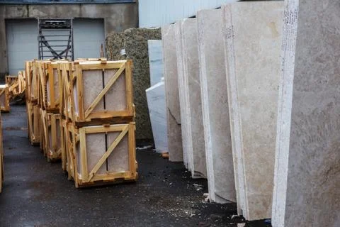 Side view of the edge of the granite slab in bulk. A stack of granite slabs - Stock Photos