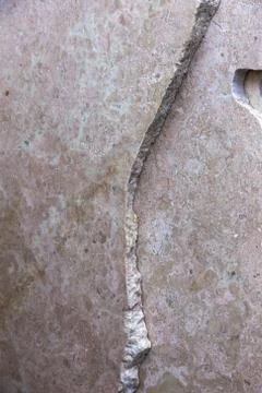 Side view of the edge of the granite slab in bulk. A stack of granite slabs - Stock Photos