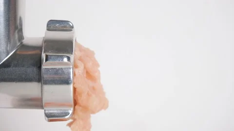 Side view on Electric meat grinder. Making minced meat in an electric meat Stock Footage 205047651