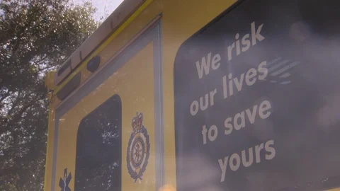 Side View Of Emergency Ambulance With Blue Lights Flashing. Stock-Footage 107552281