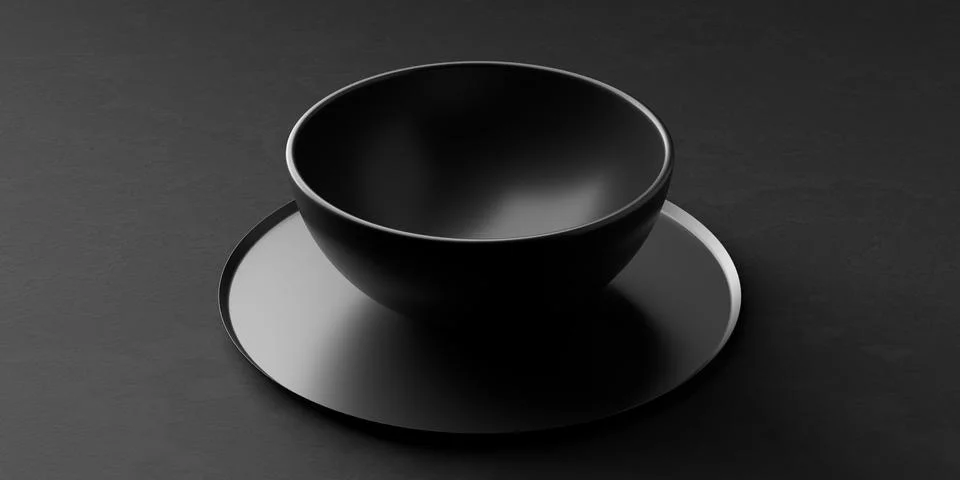 Side view of empty black ceramic bowl or dish on black plate over black sto.. Stock Illustration