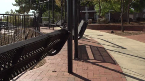 Side View of Empty Metal Swinging Chair HD Video Stockbeeldmateriaal 24632572